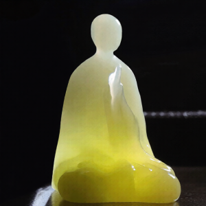 Jade Buddha statue without facial features